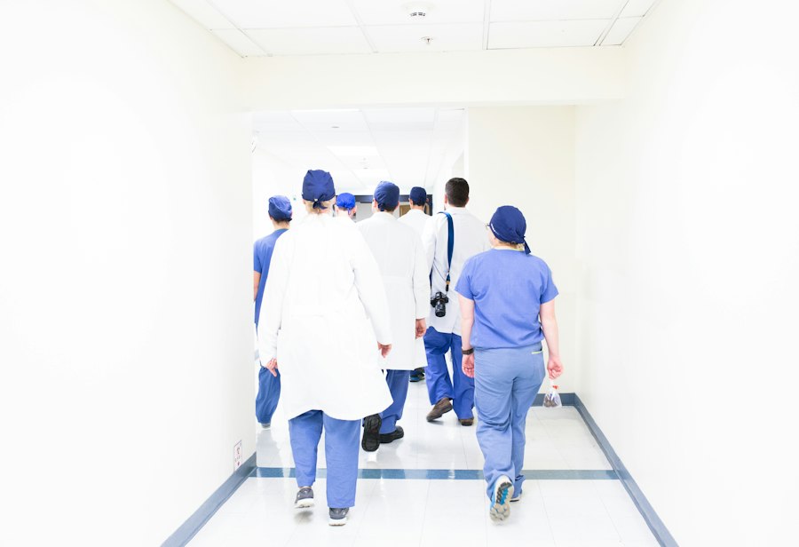Clinical team walking a bright hospital corridor