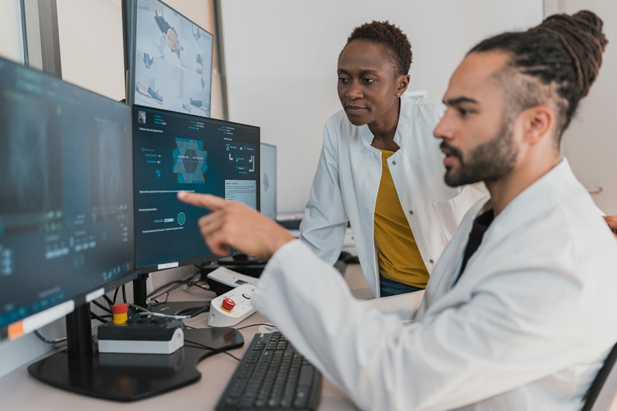 Clinicians discussing a diagnostic image at a workstation