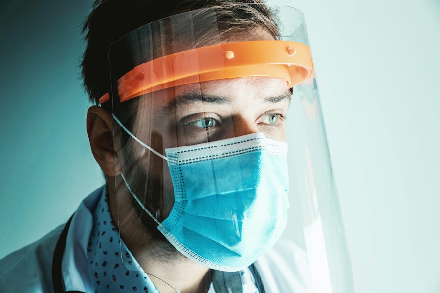 Clinician in mask and face shield